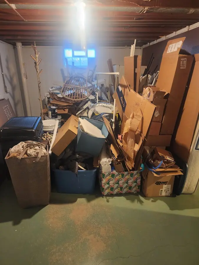 Roll-off dumpster container at job site for 8 Yard Dumpster Rental in Pimmit Hills